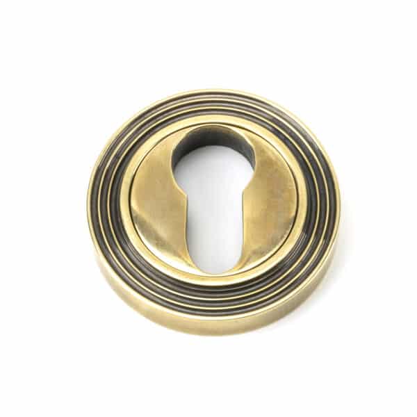 Aged Brass Round Euro Escutcheon (Beehive) 1