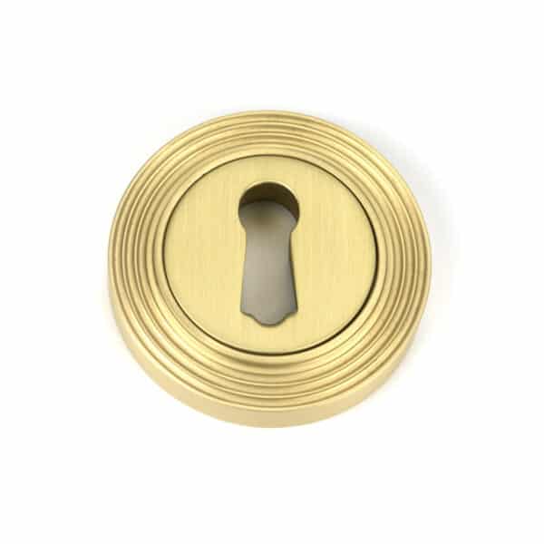 Satin Brass Round Escutcheon (Beehive) 1