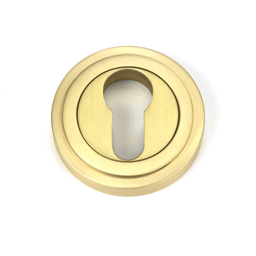 Satin Brass Round Euro Escutcheon (Art Deco) 1